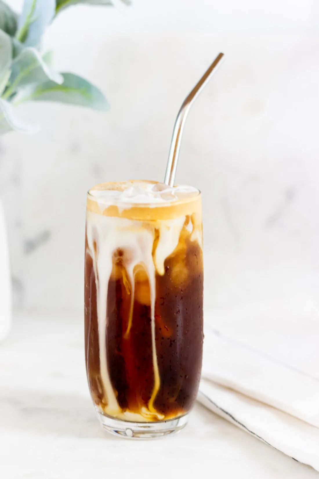 Iced Americano in a glass with ice cubes